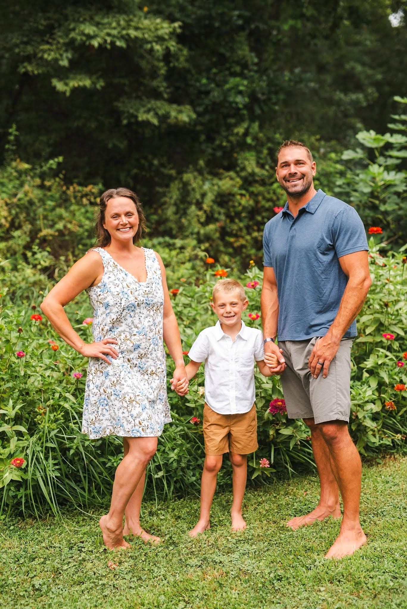 Natalie and Mike Evans with their son Luke in a garden